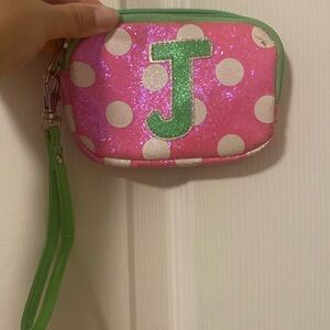 Green/white and pink poka dot mini purse from Justice.